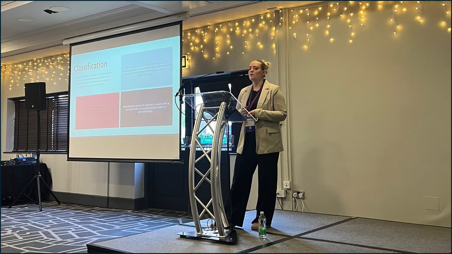 Doctoral researcher Ellie-May Storr presenting at a conference